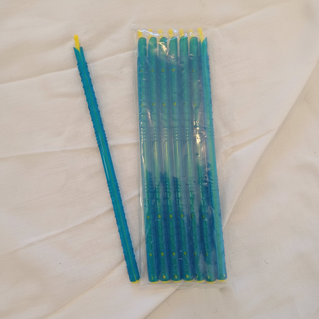 Pack of blue straws with yellow tips on a white background