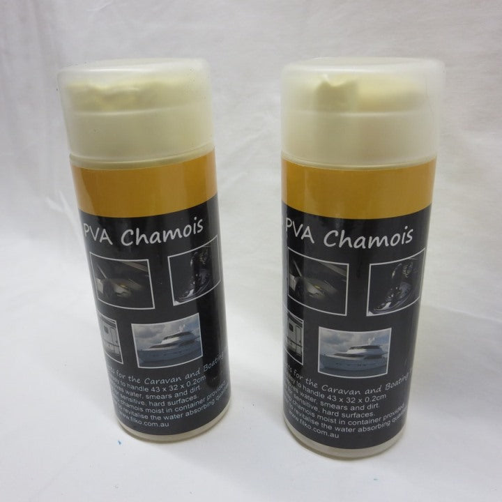 Two cans of PVA Chamois on a white background